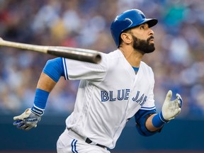 Toronto Blue Jays' Jose Bautista watches a ball go foul against the New York Yankees during the third inning of a game in Toronto on May 31, 2016. (THE CANADIAN PRESS/Mark Blinch)