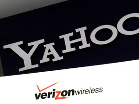Logos are seen on a laptop, Monday, July 25, 2016, in North Andover, Mass. Verizon is buying Yahoo for $4.83 billion, marking the end of an era for a company that once defined the internet. It is the second time in as many years that Verizon has snapped up the remnants of a fallen internet star as it broadens its digital reach. (AP Photo/Elise Amendola)