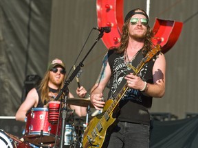 Neil Mason and Jaren Johnston of The Cadillac Three perform at the London Concert Theatre on Aug. 31. (Getty Images)