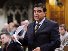 Conservative MP and Parliamentary Secretary to the Minister of Foreign Affairs and for International Human Rights Deepak Obhrai stands in the House of Commons during question period in Ottawa on May 30, 2014. As candidates from Ontario and Quebec have lined up to run for leadership of the federal Conservatives, many have wondered whether anyone from the party's Western heartland was going to join them. Well, now one is planning to -- longtime Calgary MP Deepak Obhrai. THE CANADIAN PRESS/Fred Chartrand