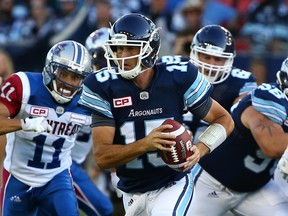 Argonauts quarterback Ricky Ray carries the ball against the Alouettes on Monday night at BMO Field. Ray had to leave the game in the fourth quarter with a suspected knee injury. (Dave Abel/Toronto Sun)