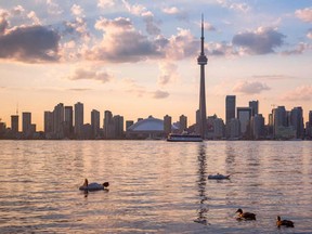 The Toronto skyline is dotted with condos, many of which present attractive opportunities for real estate investors. (febriyanta/Getty Images)