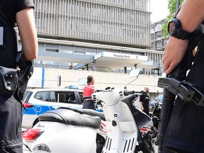 Policemen stand in front of a Benjamin-Franklin Hospital following a shooting on July 26, 2016 in south-western Berlin. (TOBIAS SCHWARZ/AFP/Getty Images)