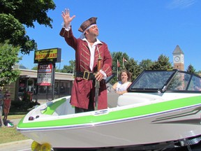 Captain Kidd is shown in this file photo waving to spectators during the 2015 Captain Kidd Days parade through Corunna's business district. The community event and fundraiser returns to Corunna Athletic Park this weekend, with the parade set for Saturday at noon. (File photo)