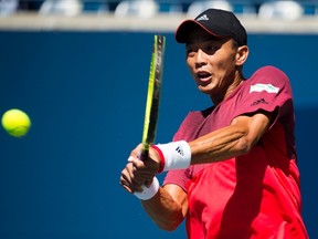 Yen-Hsun Lu of Taiwan returns the ball against Alexander Zverev of Germany during Rogers Cup tennis action in Toronto on July 26, 2016. (THE CANADIAN PRESS/Nathan Denette)