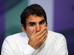 In this July 8, 2016, file photo, Roger Federer of Switzerland gives a press conference after being beaten in his men's semifinal singles match against Milos Raonic of Canada, at the Wimbledon Tennis Championships in London. (Gary Hershorn/Pool Photo via AP, File)