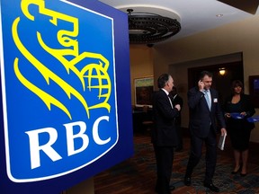 Shareholders leave the Royal Bank of Canada annual meeting, in Calgary, on Feb. 28, 2013. (THE CANADIAN PRESS/Jeff McIntosh)