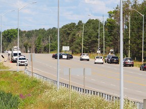 Police investigate the scene of a car accident in Caledon Tuesday July 25, 2016. (Nick Westoll/Toronto Sun)