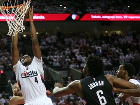 Portland Trail Blazers forward Maurice Harkless makes a shot over Los Angeles Clippers center DeAndre Jordan in game three of the first round of the NBA Playoffs at Moda Center at the Rose Quarter. (Jaime Valdez-USA TODAY Sports)