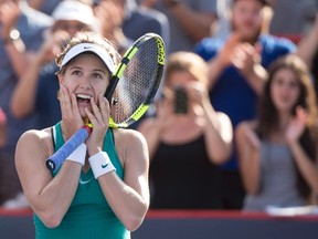 Canada’s Eugenie Bouchard reacts after beating Lucie Safarova of the Czech Republic during the Rogers Cup Tuesday July 26, 2016 in Montreal. (THE CANADIAN PRESS/Paul Chiasson)