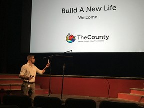 BRUCE BELL/THE INTELLIGENCER
Prince Edward County's director of community development, Neil Carbone, launches the municipality's Build a New Life campaign at the Regent Theatre in Picton Tuesday evening. The campaign features several videos promoting the benefits of living and working in Prince Edward County.