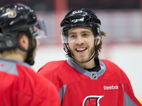 Mike Hoffman (right) and Mika Zibanejad share a laugh as the Ottawa Senators practice at the Canadian Tire Centre. (Wayne Cuddington/Postmedia Network)