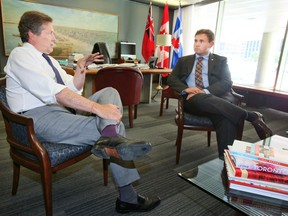 Michael Ford, right, meets with Mayor John Tory inside City Hall on Wednesday, July 27, 2016. (Veronica Henri/Toronto Sun)