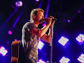 Dierks Bentley performs at LP Field at the CMA Music Festival on Thursday, June 11, 2015, in Nashville, Tenn.