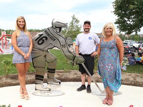 The Hancock family, which includes Jaymie, left, and parents, Dean and Kim, attended the grand opening of DJ Hancock Memorial Park in Sudbury, Ont. on Wednesday July 27, 2016. The park is named after their son, DJ, who was killed in a collision when his car was struck head-on by an intoxicated driver on the southwest bypass in August 2014. John Lappa/Sudbury Star/Postmedia Network