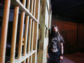 Mark Howitt at the entrance to the VIP room at The Asylum in the old Navy League Hall in Sudbury, Ont. Gino Donato/Sudbury Star/Postmedia Network