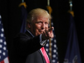 Republican presidential candidate Donald Trump points to the crowd after speaking during a campaign rally at Lackawanna College, Wednesday, July 27, 2016, in Scranton, Pa. (Jake Danna Stevens/The Times & Tribune via AP)