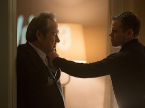 In this image released by Universal Pictures, Tommy Lee Jones, left, and Matt Damon  appear in a scene from "Jason Bourne." (Melinda Sue Gordon/Universal Pictures)
