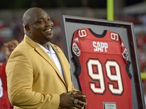 Former NFL player Warren Sapp was bitten by a shark during a fishing trip off the Florida Keys on Wednesday, July 27, 2016. (Phelan M. Ebenhack/AP Photo/Files)