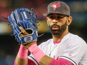 Toronto Blue Jays outfielder Jose Bautista warms up before a game against the Los Angeles Dodgers at the Rogers Centre in Toronto on May 8, 2016. (Dave Thomas/Toronto Sun/Postmedia Network)
