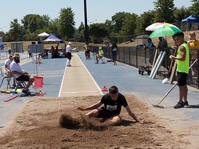 Callum Bruser from Sudbury hits the dirt while competing at the Athletics Ontario Bantam, Midget, Youth Championships in Windsor on the weekend. He won silver in the midget boys triple jump with a final attempt of 11.81 metres. Athletics Ontario photo