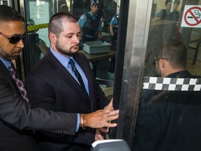 Const. James Forcillo arrives for sentencing at Toronto Superior Court of Justice Courthouse at 361 University Avenue in Toronto, Ont. on Thursday July 28, 2016. Ernest Doroszuk/Toronto Sun/Postmedia Network