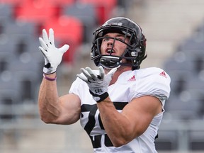 Ottawa Redblacks FB Brendan Gillanders makes a catch during team practice at TD Place on Thursday July 28, 2016. (Errol McGihon/Postmedia News)