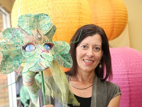 Trisha Mazzuca displays a dragon puppet that will be on display during Capreol Days this weekend in Capreol, Ont. John Lappa/Sudbury Star/Postmedia Network