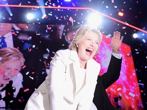 Democratic presidential nominee Hillary Clinton celebrates on stage after she accepted the nomination during the fourth and final night of the Democratic National Convention at the Wells Fargo Center, July 28, 2016 in Philadelphia, Pa.  (ROBYN BECK/AFP/Getty Images)