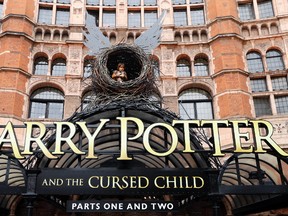 In this photo taken on Thursday, July 28, 2016, the Palace Theatre in London shows advertising for the new Harry Potter play. (AP Photo/Kirsty Wigglesworth)