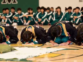 Exchange students from Shikaoi, Japan put on a cultural performance for Stony Plain’s students at Memorial Composite High School in Stony Plain on Tuesday, Oct. 6, 2015. The exchange occurs for two weeks every October, and is part of the twining program that the Town of Stony Plain has with the Town of Shikaoi. - File photo