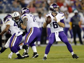 Vikings quarterback Taylor Heinicke passes against the Titans during preseason NFL action in Nashville, Tenn., on Sept. 3, 2015. Heinicke is out up to three months after he severed a tendon in his left foot earlier this month. (James Kenney/AP Photo/Files)