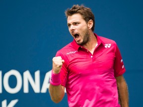 Stan Wawrinka reacts while playing against Kevin Anderson during men's quarterfinal action at the Rogers Cup in Toronto on Friday, July 29, 2016. (Nathan Denette/The Canadian Press)