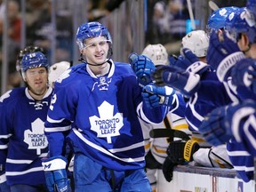 Toronto Maple Leafs defenceman Martin Marincin gets congratulated after his goal against the Buffalo Sabres at the Air Canada Centre in Toronto on March 19, 2016. (John E. Sokolowski/USA TODAY Sports)