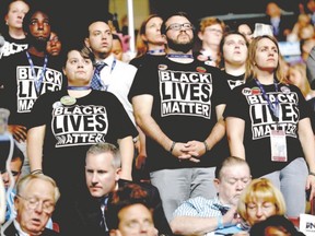 Supporters of the Black Lives Matter movement against racism stand during remarks from the Mothers of the Movement during the Democratic National Convention last week in Philadelphia, Penn. Imam Abd Alfatah Twakkal says the scourge of racism can be traced to a single blameworthy trait ? arrogance ? existing in the inner conscious of a person and resulting in the feeling of superiority over another human being simply because of skin colour, ethnicity or cultural background. (Joe Raedle/Getty Images)