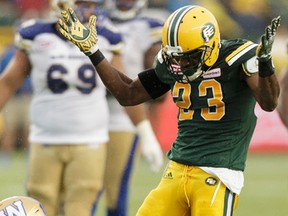 Edmonton's Marcell Young (23) takes down Winnipeg's Weston Dressler (7) during the first half of a CFL football game between the Edmonton Eskimos and the Winnipeg Blue Bombers at Commonwealth Stadium in Edmonton, on Thursday, July 28, 2016. Ian Kucerak / Postmedia (For Edmonton Journal/Sun story by Gerry Moddejonge)