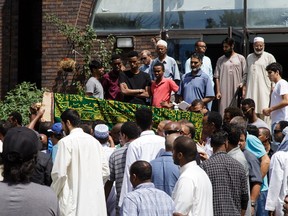 The casket is carried out of the Mosque following the funeral service for Abdirahman Abdi held at the Ottawa Mosque on July 29, 2016. Jana Chytilova/Postmedia