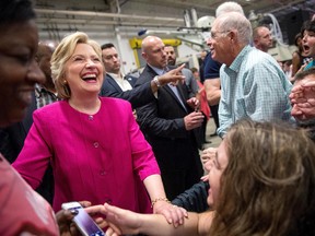 Democratic presidential candidate Hillary Clinton greets members of the audience after speaking at a rally at K'NEX, a toy company in Hatfield, Pa., Friday, July 29, 2016.  (AP Photo/Andrew Harnik)