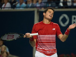 Milos Raonic reacts during his quarterfinal match with Gael Monfils at the Rogers Cup in Toronto on Friday, July 29, 2016. (THE CANADIAN PRESS/Nathan Denette)