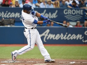 Toronto Blue Jays slugger Edwin Encarnacion hits a solo home run against the Baltimore Orioles Friday, July 29 in Toronto. (THE CANADIAN PRESS/Jon Blacker)