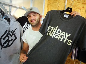 Eric Olek, owner of Friday Knight clothing displays some of his items in Winnipeg, Man. Monday July 25, 2016. Olek now has his products stocked by Below the Belt. (Brian Donogh/Winnipeg Sun/Postmedia Network)