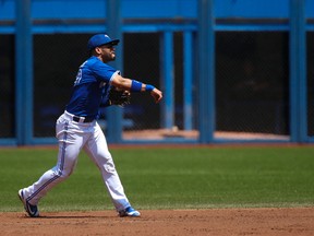 Blue Jays second baseman Devon Travis has been solid defensively this season. (Jack Boland/Toronto Sun)