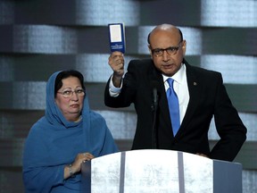 Khizr Khan, father of deceased Muslim U.S. Soldier Humayun S. M. Khan, holds up a booklet of the US Constitution as he delivers remarks on the fourth day of the Democratic National Convention at the Wells Fargo Center, July 28, 2016 in Philadelphia, Pennsylvania. (Photo by Alex Wong/Getty Images)