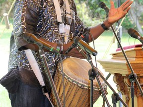 Babarinde Williams gives a drumming demonstration during Emancipation Day celebrations at Uncle Tom's Cabin on Saturday. (Trevor Terfloth/The Daily News)