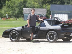 Ryan Leclerc, 16, poses with his '86 Pontiac Fiero on Friday, July 29, 2016. (Winnipeg Sun/Postmedia Network)