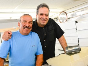 From left, brothers and co-owners Peter and Mark Boushey from Boushey's Fruit Market on Elgin Street poses for a photo in the cashier area as they close it's doors for the last time on Sunday, July 31, 2016. (James Park, Postmedia News)