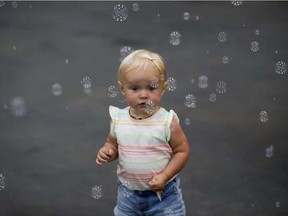 The bubbles at the Farm exhibit were a highlight for 1-year-old Sailish Plante's first K-Days.