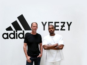 Adidas CMO Eric Liedtke, left, and  Kanye West. (Supplied by WENN.COM)