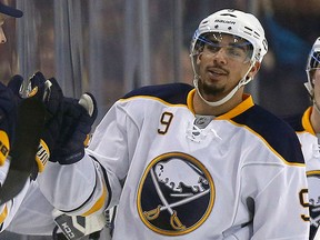 In this Dec. 26, 2015, file photo, Buffalo Sabres forward Evander Kane (9) celebrates his goal during the second period of an NHL hockey game against the Boston Bruins in Boston.  (AP Photo/Michael Dwyer, File)