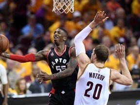 Delon Wright #55 of the Toronto Raptors drives to the basket in the fourth quarter against Timofey Mozgov #20 of the Cleveland Cavaliers in game five of the Eastern Conference Finals during the 2016 NBA Playoffs at Quicken Loans Arena on May 25, 2016 in Cleveland, Ohio. (Jason Miller/Getty Images/AFP)